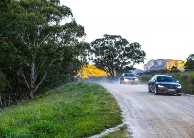 Cars driving on gravel road Audi A8 and S8 Media Launch