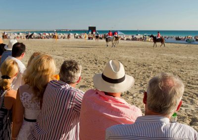Spectators watching game Cable Beach Broome Polo Tournament