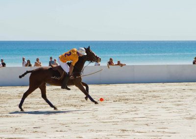 Player and horse Cable Beach Broome Polo Tournament