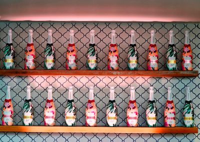bottles displayed on shelf Chandon x Seafolly PR launch event