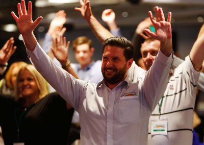 Cheesecake Shop Franchise Conference team bonding exercise hand in the air