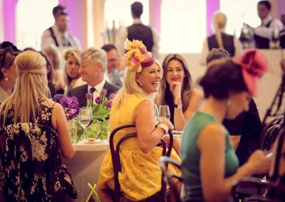 Guests at table talking laughing Crown Resorts Sydney Ladies Luncheon