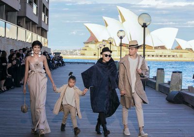 H’Hen Nie and Le Xuan Tien (far right) took to the catwalk with designer Do Manh Cuong and his young son