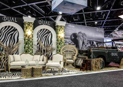 Display vintage car lounge chairs sitting area Dual Australia Exhibition Stand Safari Glam