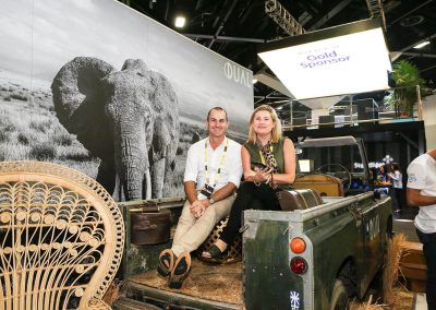 Guest sitting in vintage car Dual Australia Exhibition Stand Safari Glam