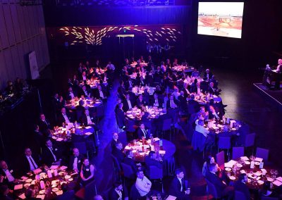 Guests sitting at dining table Engineering Excellence Awards Roadshow