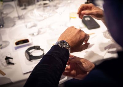 Close up guest's arm at Gregory Jewellers & Breitling VIP client dinner