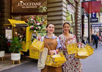 LOccitance staff with gift bags at Store Opening