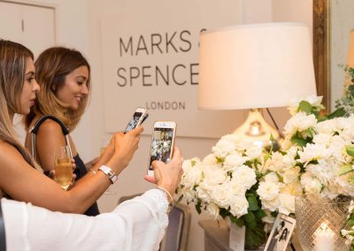 2 female guests taking photos Marks & Spencer Australian Online Store launch