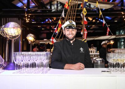 Bartender wearing sailor hat Mirvac Christmas Party Ahoy Sailor Nautical