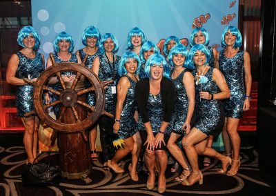 Guests fancy dress posing Mirvac Christmas Party Ahoy Sailor Nautical