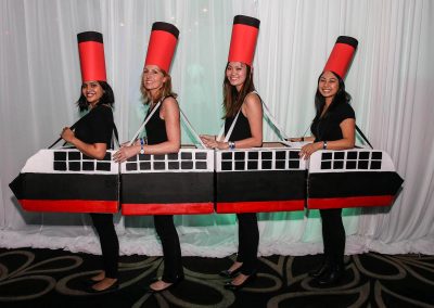 Guests fancy dress posing Mirvac Christmas Party Ahoy Sailor Nautical