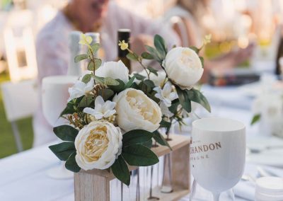 Close up flowers and goblet Moet Dinner en Blanc National Sponsorship Activation