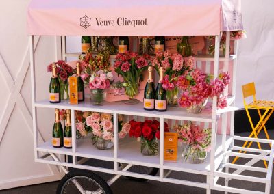 Display cart with champagne and flowers
