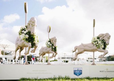 Floral display wooden horses Moet et Chandon Lawn at Melbourne Racing Club