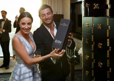NRL player holding champagne box Moet et Chandon Tribute to Roger Federer event