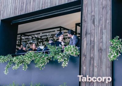 Guests talking Tabcorp Birdcage Marquee Alfresco Cafe